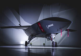Boeing Australia has built the first of three Loyal Wingman aircraft, which will serve as the foundation for the Boeing Airpower Teaming System being developed for the global defense market. The aircraft are designed to fly alongside existing platforms and use artificial intelligence to conduct teaming missions. (Boeing photo)